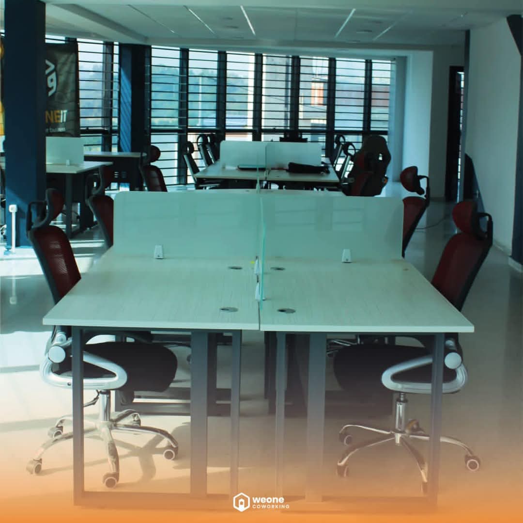 Modern coworking space with desks and computers